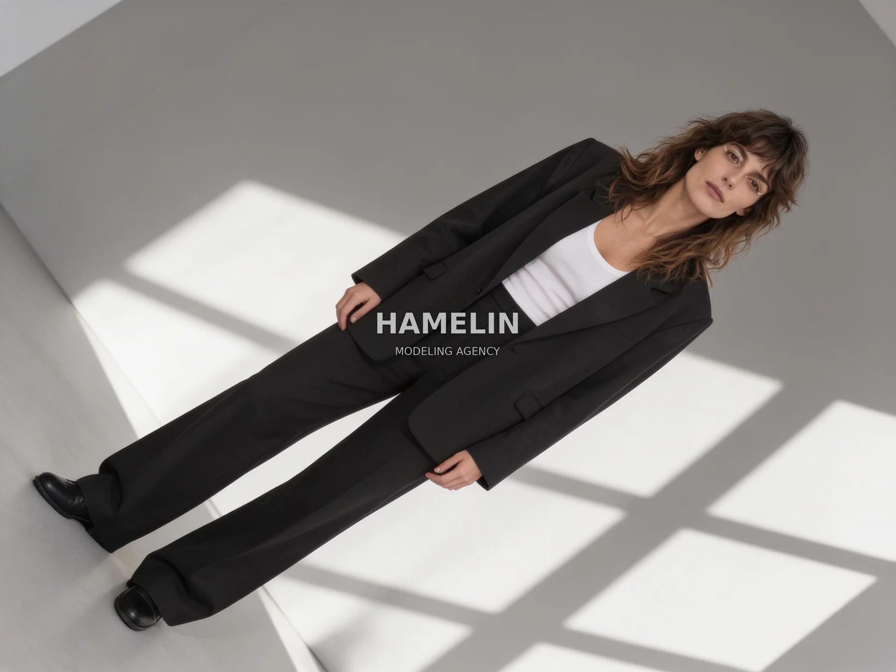 Black Tailoring & Geometric Shadow Studio Editorial 2
